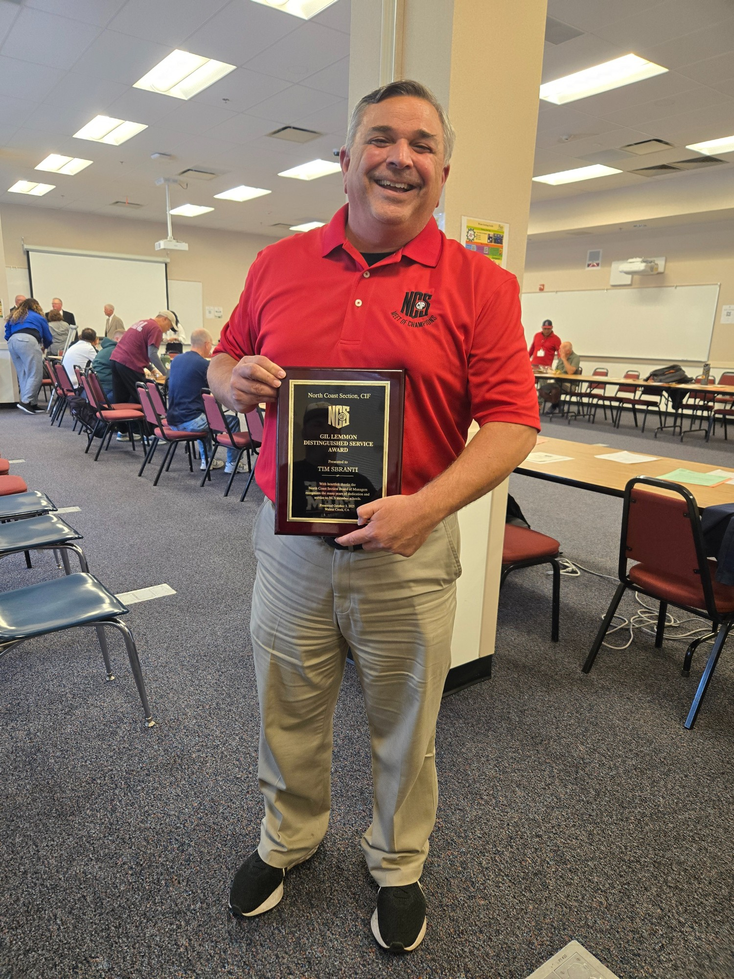 Former Athletic Director Tim Sbranti Honored with NCS Distinguished Service Award