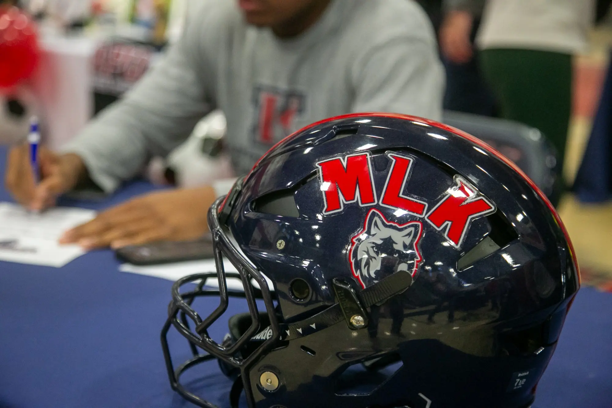 LARGE GROUP SIGNS ON FOR COLLEGE ATHLETICS - Martin Luther King
